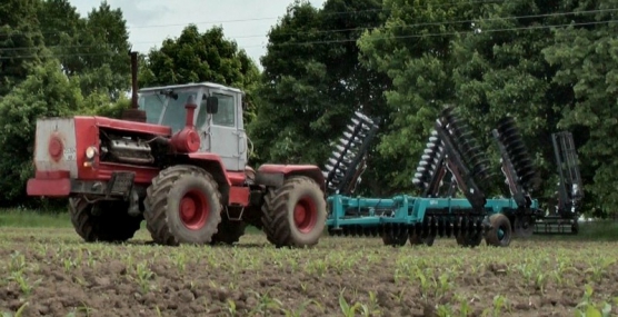 Борона дискова легка причіпна БДЛП-8,0 з прикотуючим катком у комлектації з дисками- "Ромашка" +"Круглий"